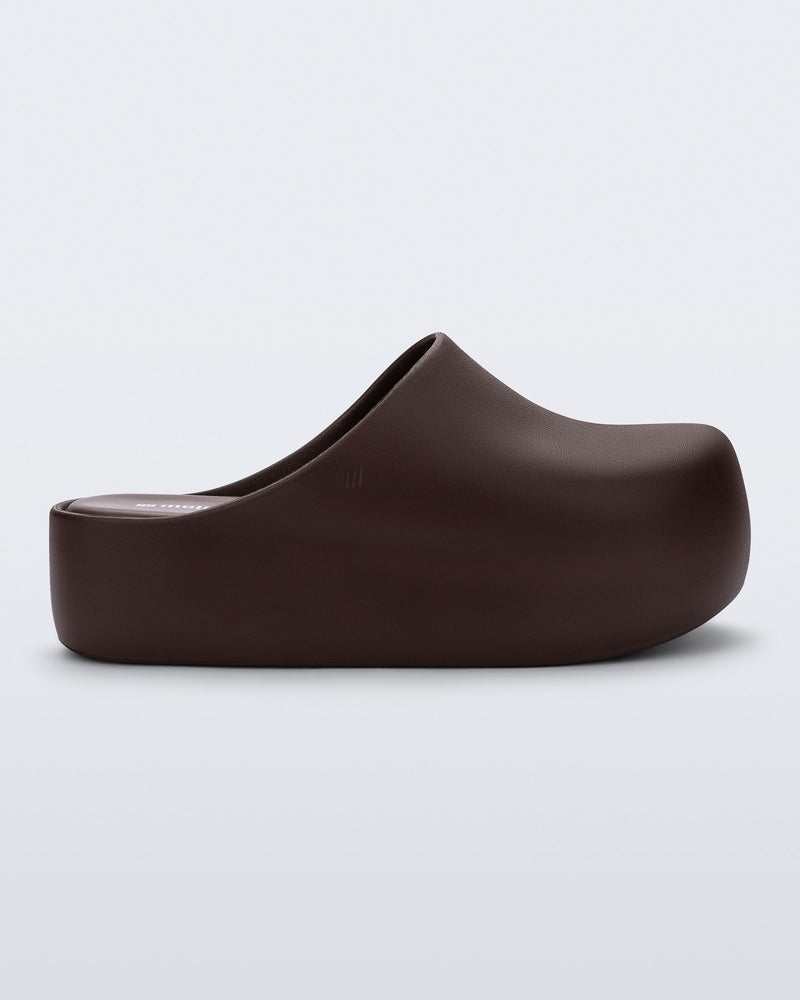 Side view of a brown Free Clog Up Platform
