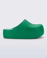 Side view of a green Free Clog Up Platform
