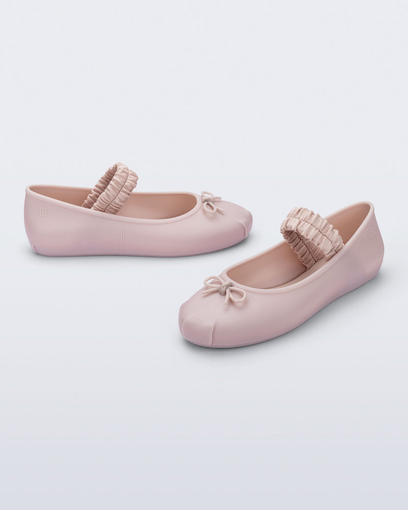 Side and angled view of a pair of pink Sophie Scrunch flats