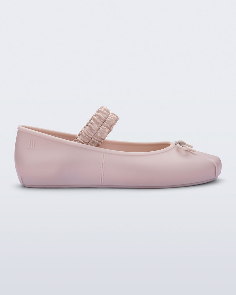 Side view of a pink Sophie Scrunch flat