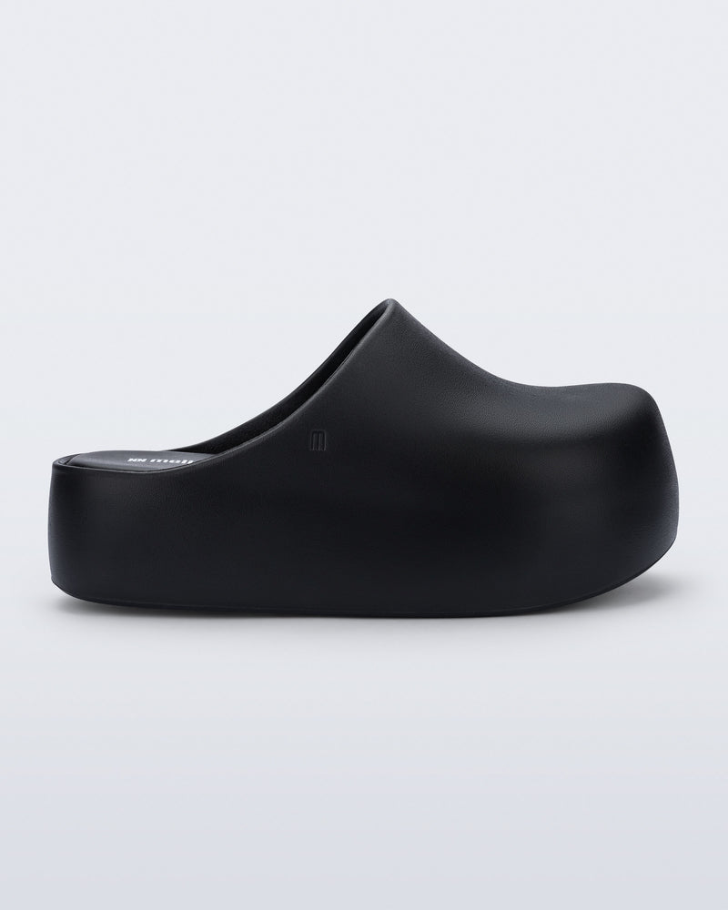 Side view of a black Free Clog Up Platform