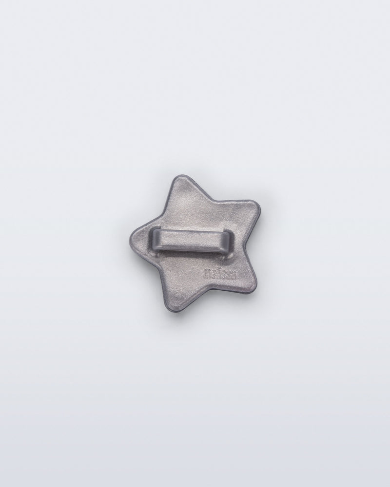 Back view of a silver star shoe charm
