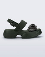 Side view of a green Push platform Sandal