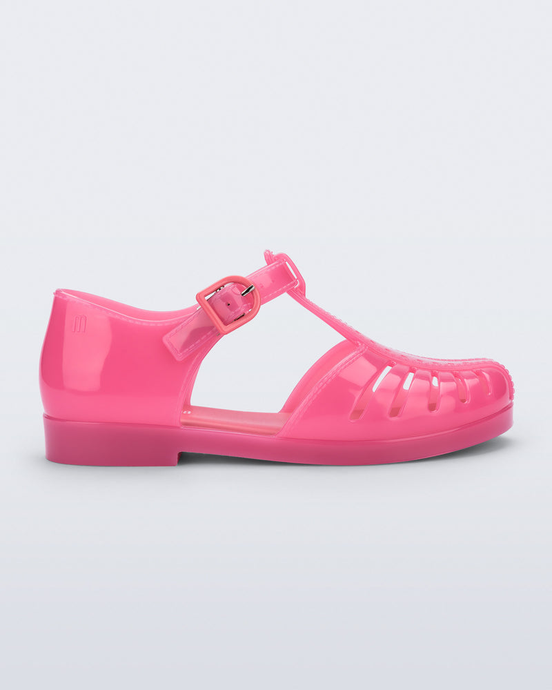 Side view of a pink Aranha 79 kids flat with buckle