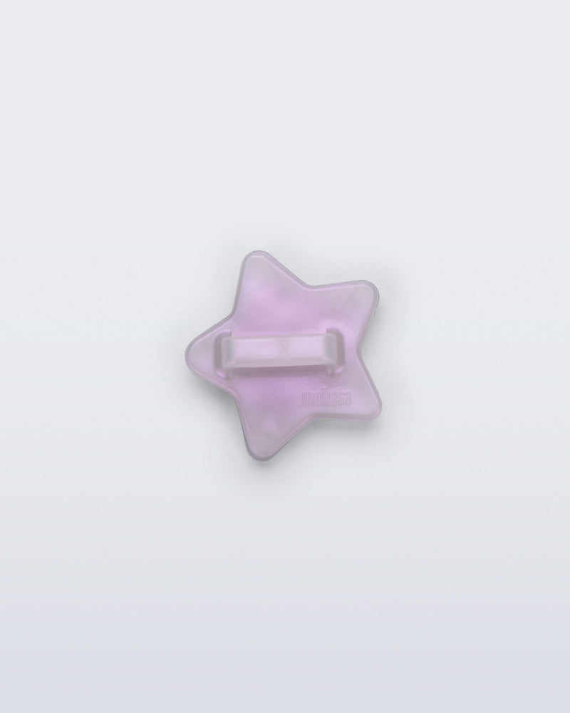 Back view of a pearly lilac star shoe charm