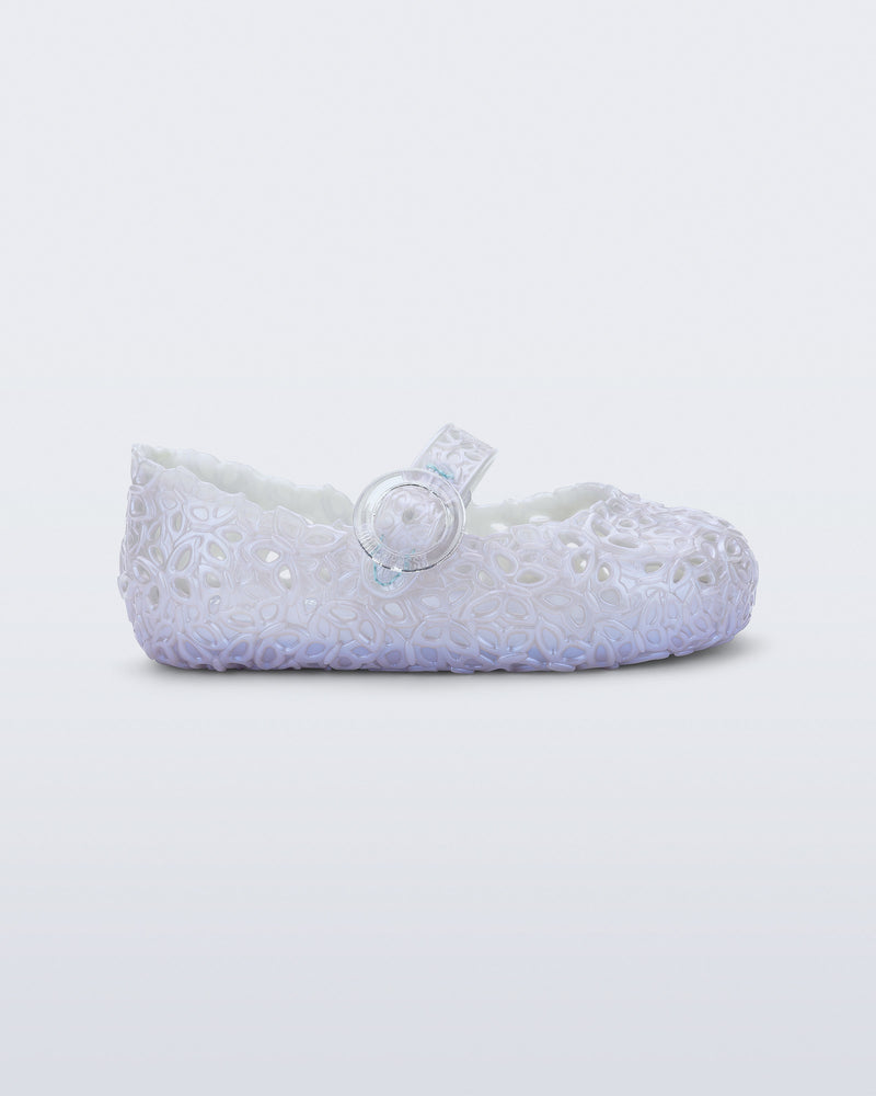 Side view of a pearly blue Pollen baby flat