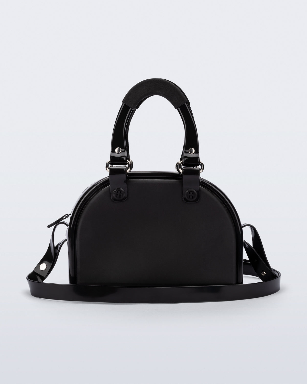Back view of a black Bowling bag with handle strap and cross body strap
