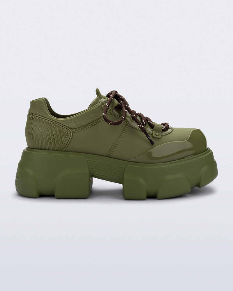 Side view of an army green Camp platform Sneaker with brown laces