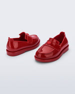 Back and angled view of a pair of red Royal Love baby loafers