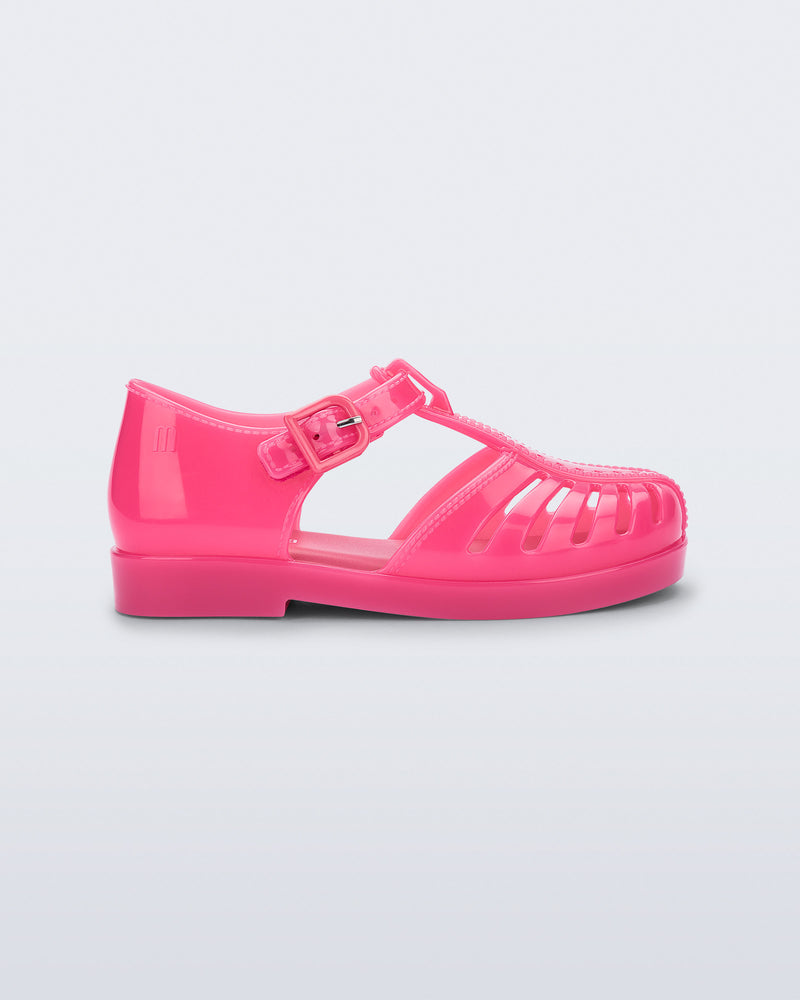 Side view of a pink Aranha 79 baby flat with buckle