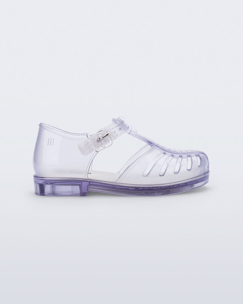 Side view of a clear Aranha 79 baby flat with buckle