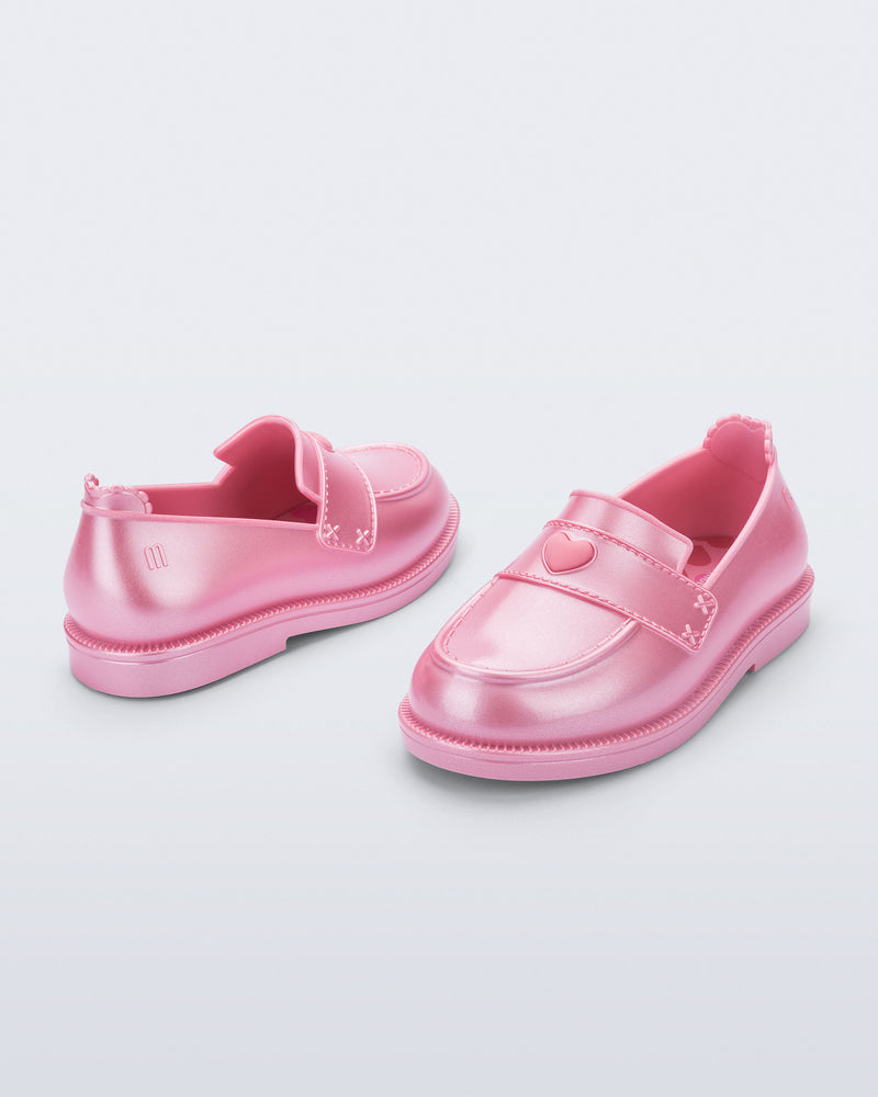 Back and angled view of a pair of metallic pink Royal Love baby loafers