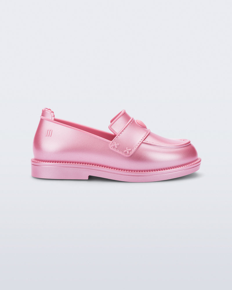 Side view of a metallic pink Royal Love baby loafer