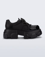 Side view of a black Camp platform Sneaker with black laces