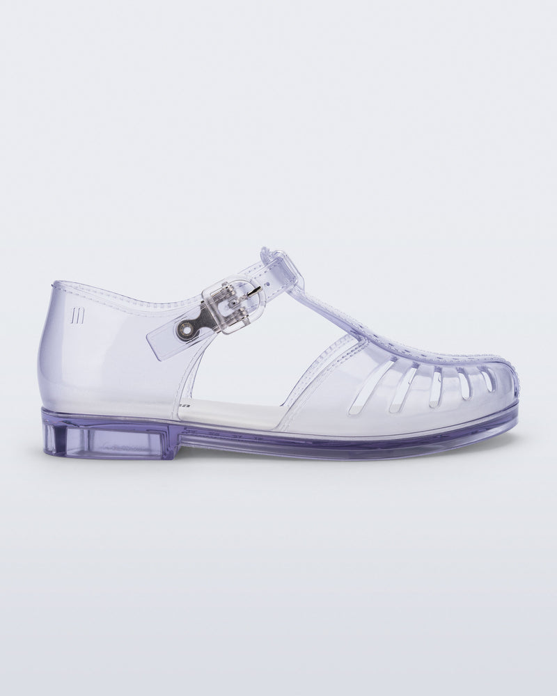 Side view of a clear Aranha 79 kids flat with buckle
