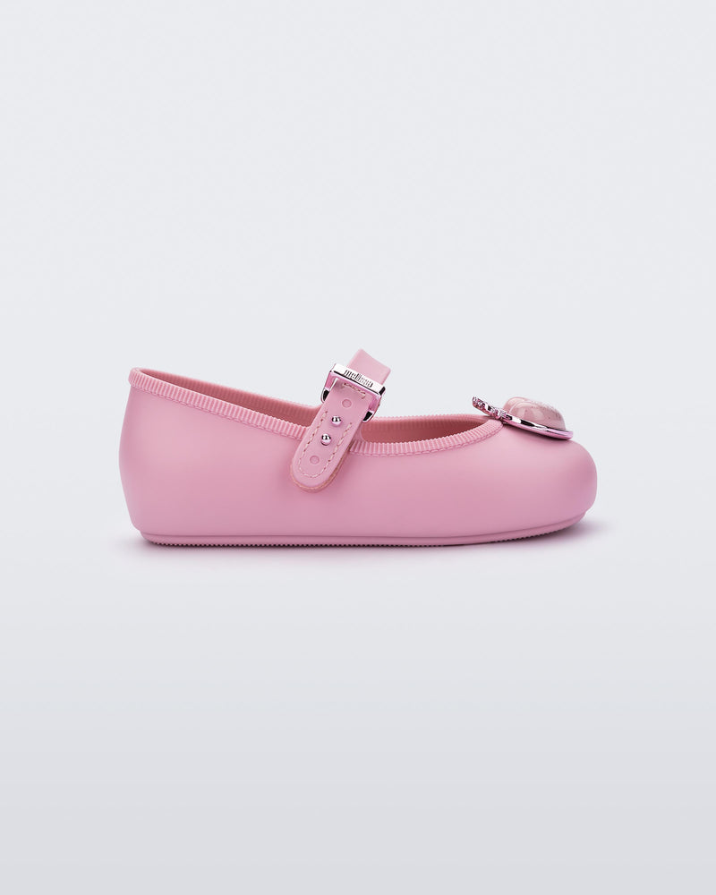Side view of a pink Soft Ballerina Princess baby flat with a pink heart on top