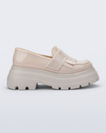 Side view of a beige Royal Plus platform loafer