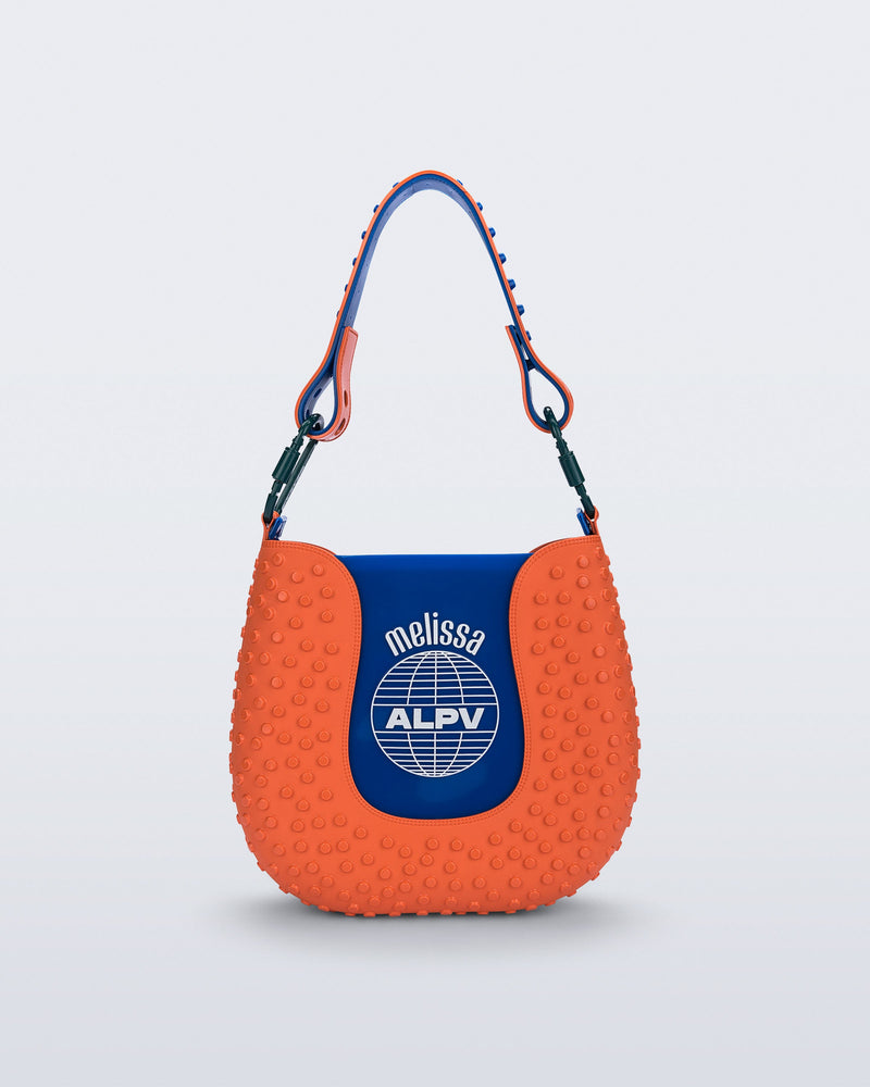 Front view of an orange Nina Bag + Alexandre Pavao shoulder bag with blue accents