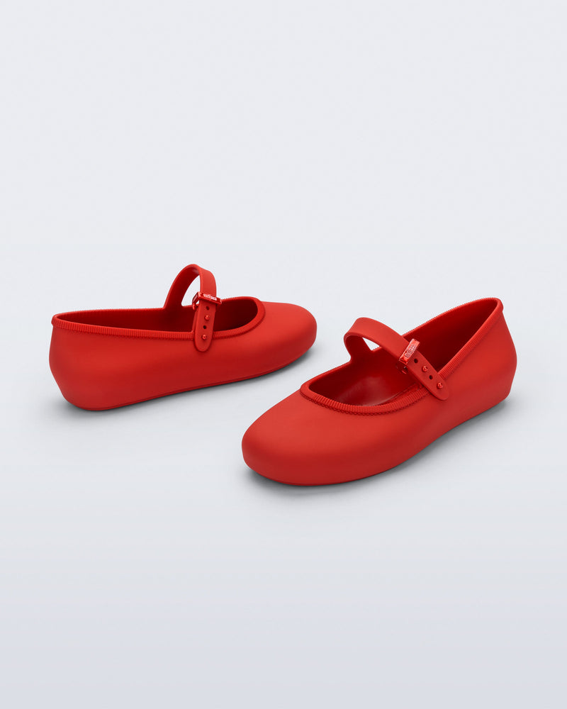 Back and side angled view of a pair of red Soft Ballerina kids flat with strap