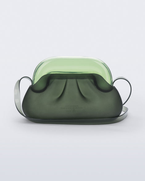 Back view of a small green bag with clear green clutch and long strap