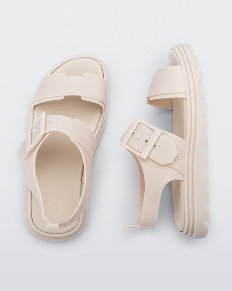 Top and side view of a pair of beige Connection Papete sandals