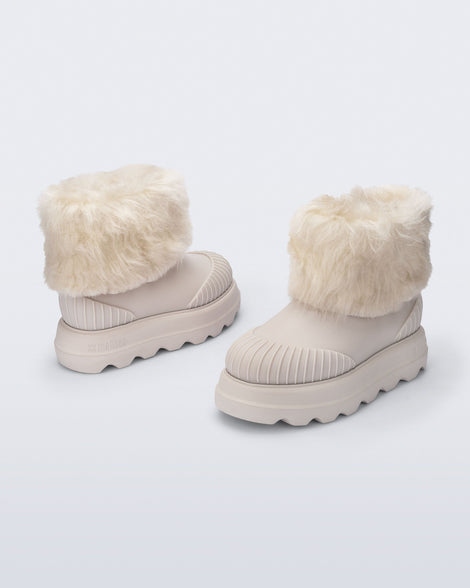 Back and angled view of a pair of beige Warm Boot with fuzzy cuff and insole