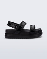 Side view of a black Dune Platform Sandal with faux stitching on the straps