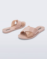 Back and angled view of a pair of pink Essential Cross Slide sandals