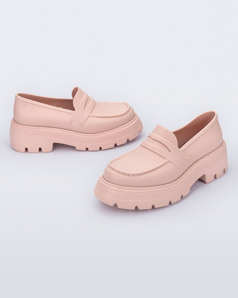 Angled view of a pair of matte red Royal adult loafers