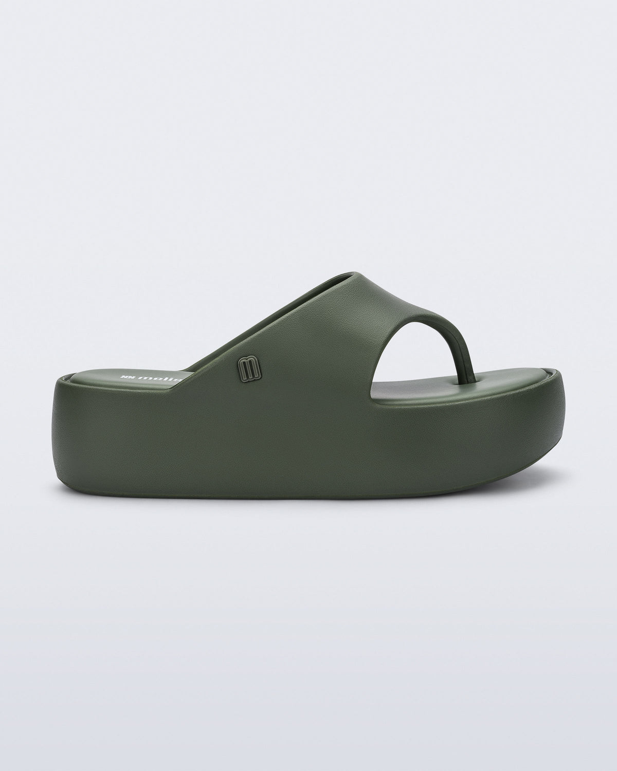 Side view of a green Free Platform Thong flip flop