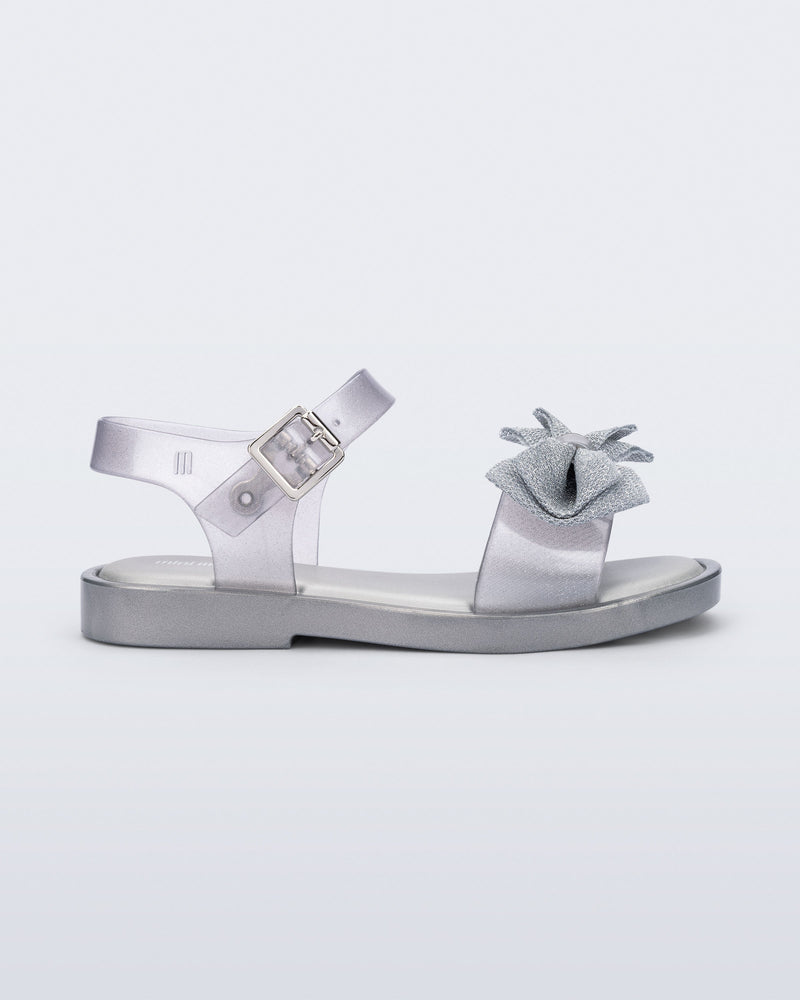 Side view of a pearly silver Mar Sweet kids sandal