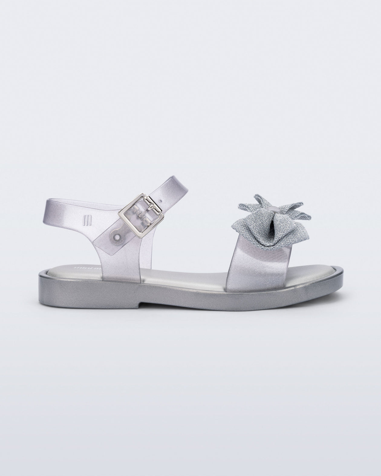 Side view of a pearly silver Mar Sweet kids sandal