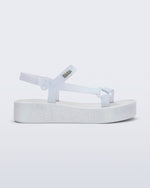 Side view of a white glitter Sun Downtown Platform sandal