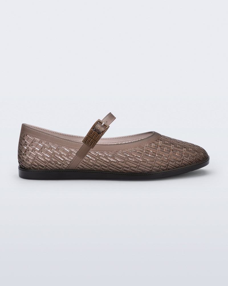 Side view of a transparent brown Harper flat