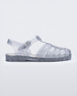 Side view of glitter clear silver Possession fisherman sandal