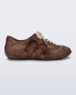 Side view of a bronze Motion sneaker with beige laces