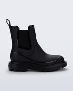 Side view of a black Noir Boot with black sole