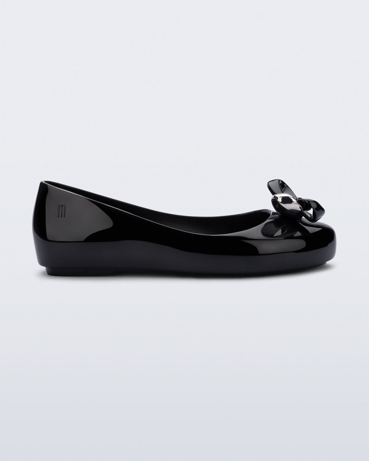 Side view of a black Sweet Love Glam kids ballerina flats with bow