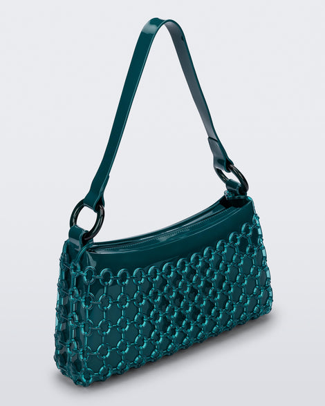 Angled view of a green Hoop bag with short shoulder strap
