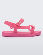 Side view of a pink Sun Downtown baby sandal
