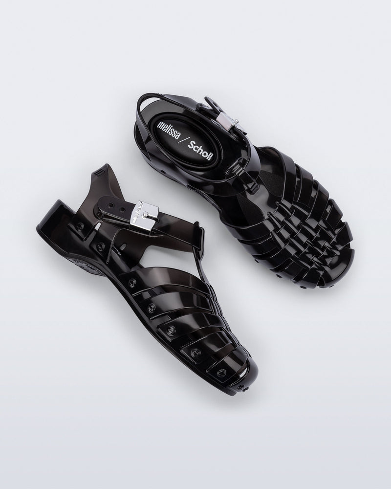 Side and top view of a pair of black Possession Pescura + Scholl fisherman sandals