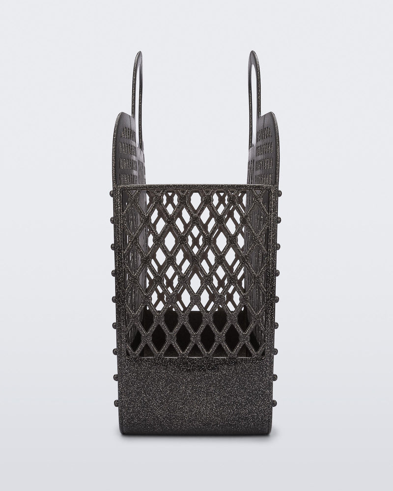 Side view of the glitter black Bag + Bimba y Lola