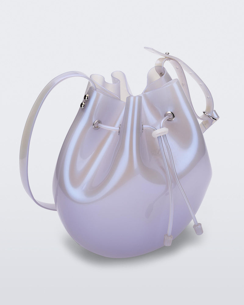 Angled view of a pearly blue Sac drawstring bag.
