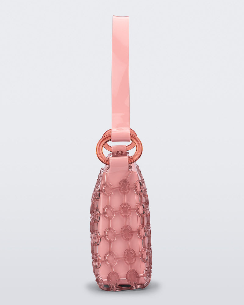 Side view of a pink Hoop bag with short shoulder strap