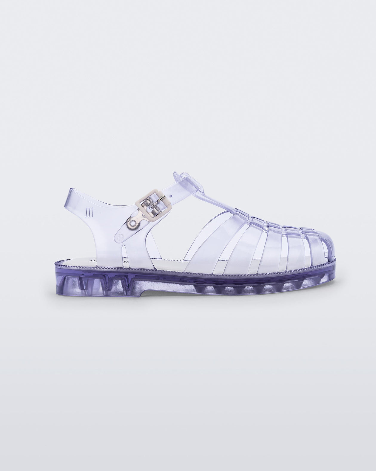 Side view of a clear Mini Melissa Possession sandal with several straps and a clear base.