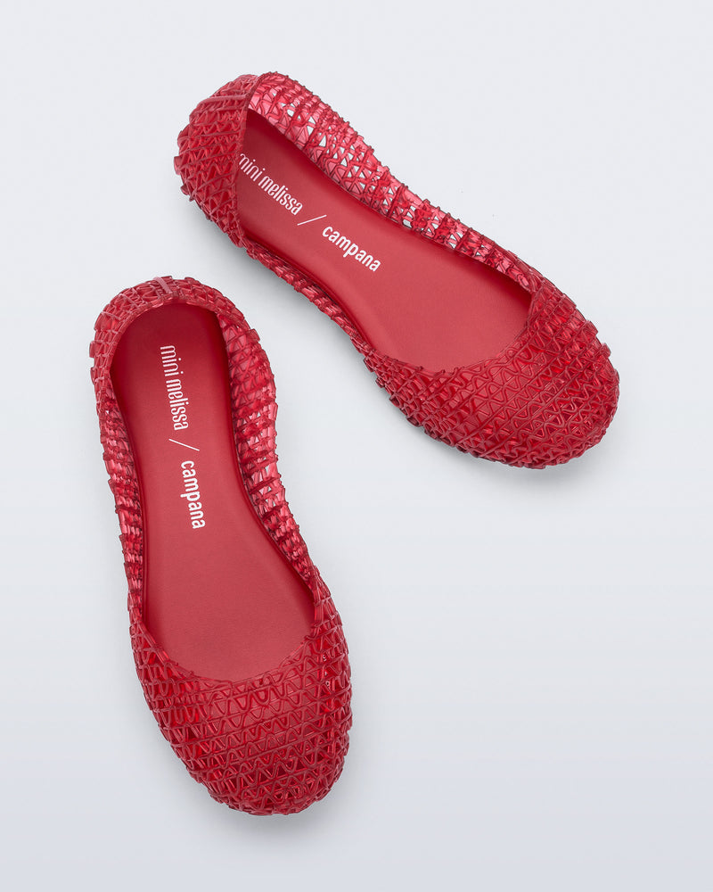 Top view of a pair of red Campana kids ballerina flats