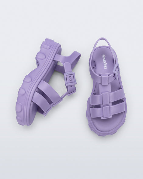 Top and side view of a pair of lilac Ella kids sandals