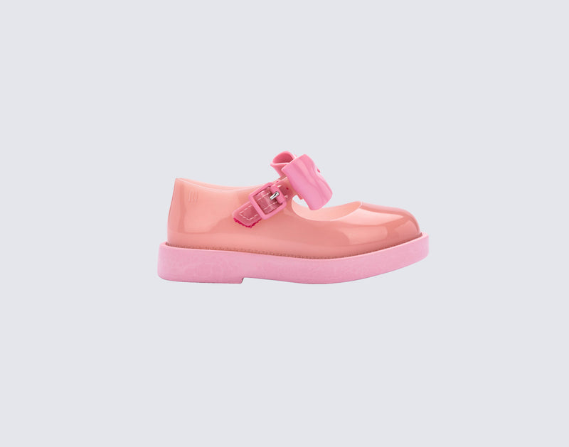 side view of a pink Blair baby mary jane with bow in the strap