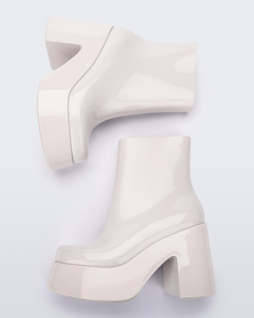 Top view of a pair of white Melissa Nubia platform heel boots.
