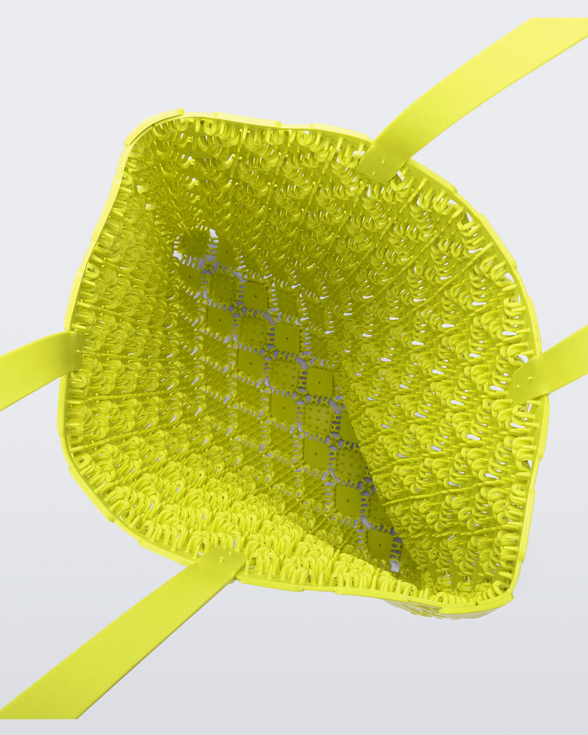 Top view of a yellow Melissa Mogu + Hikaru Matsumura bag